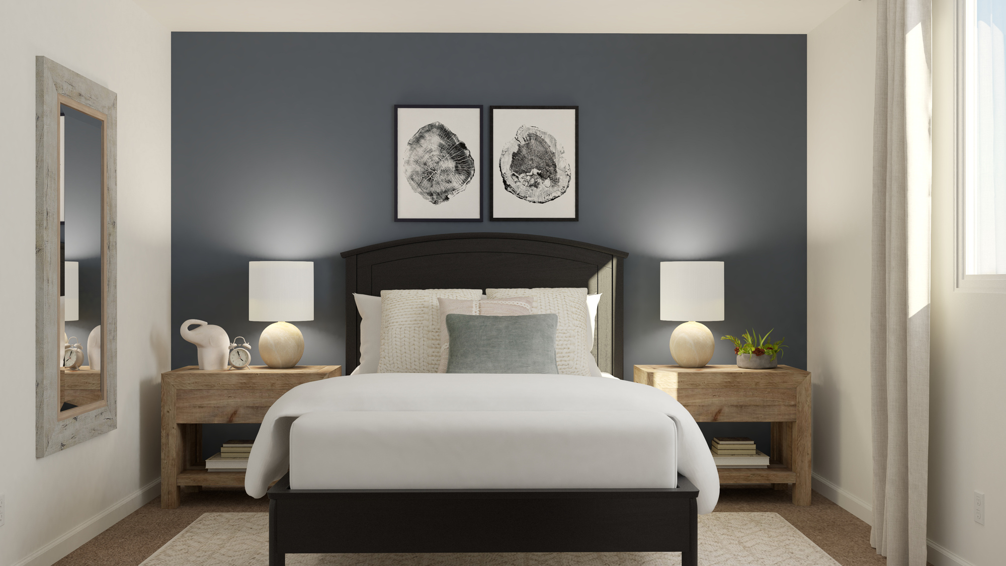 A bedroom with a bed and a table.