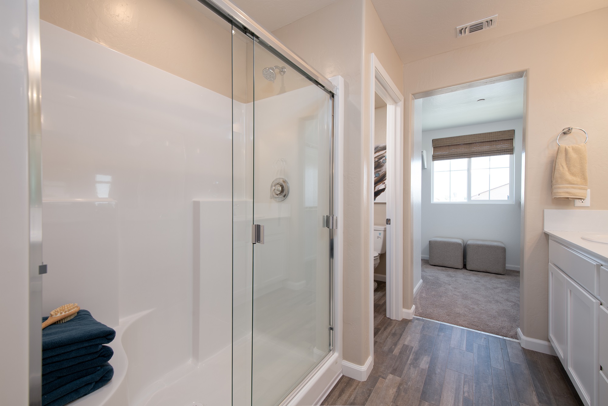 A bathroom with a shower unit.