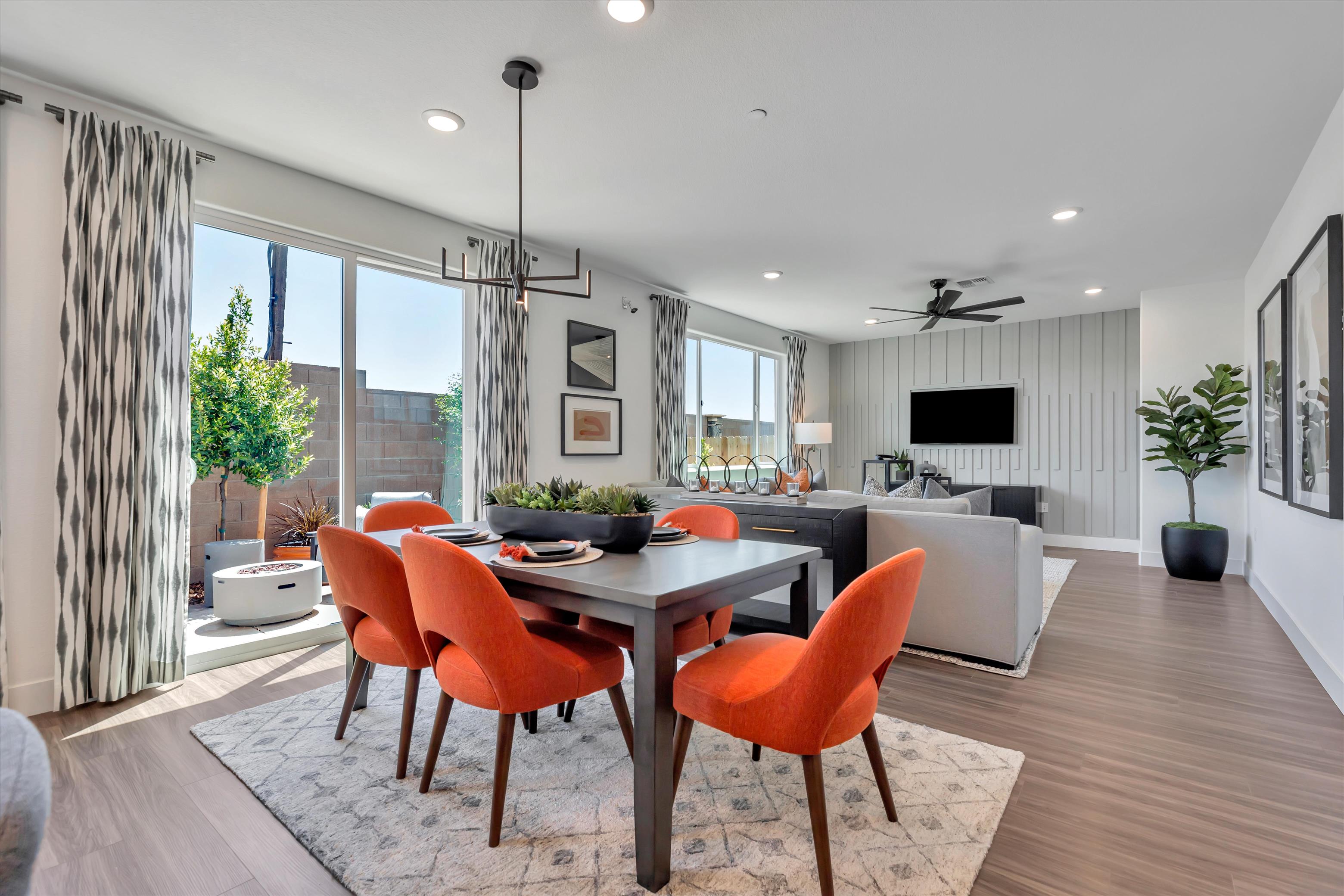 A room with a table and chairs.