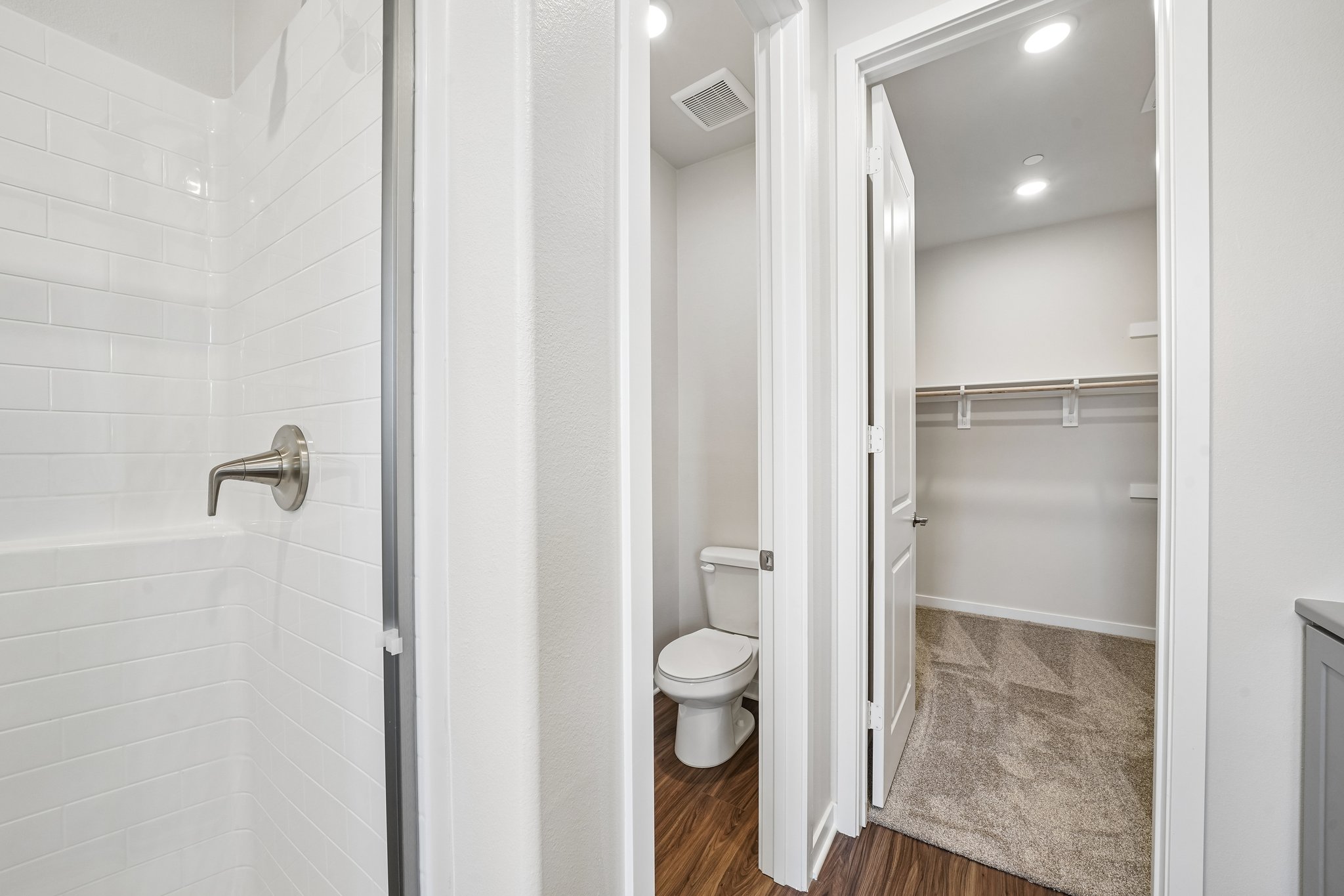 A bathroom with a glass shower.