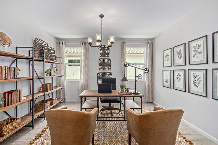 A room with a table and chairs.