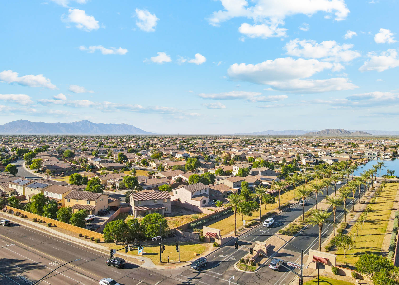 A city with a body of water in the background.
