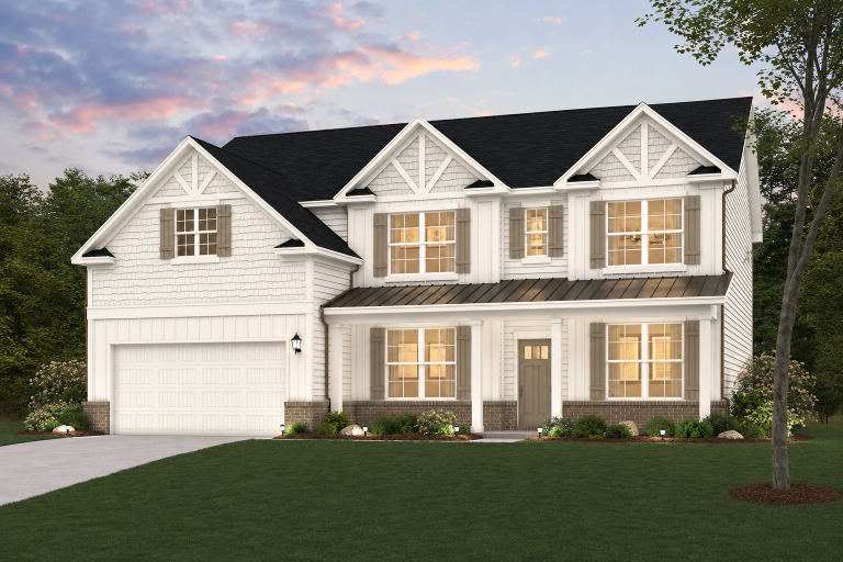 A house with a lawn in front of it.