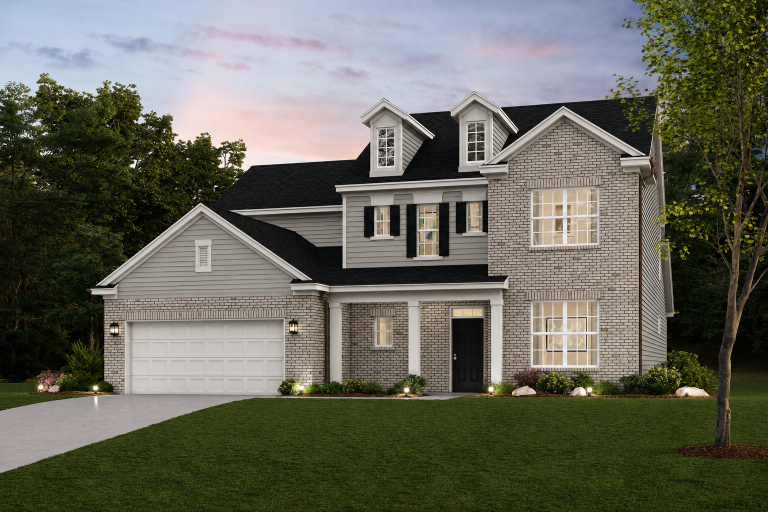 A house with a large front yard.