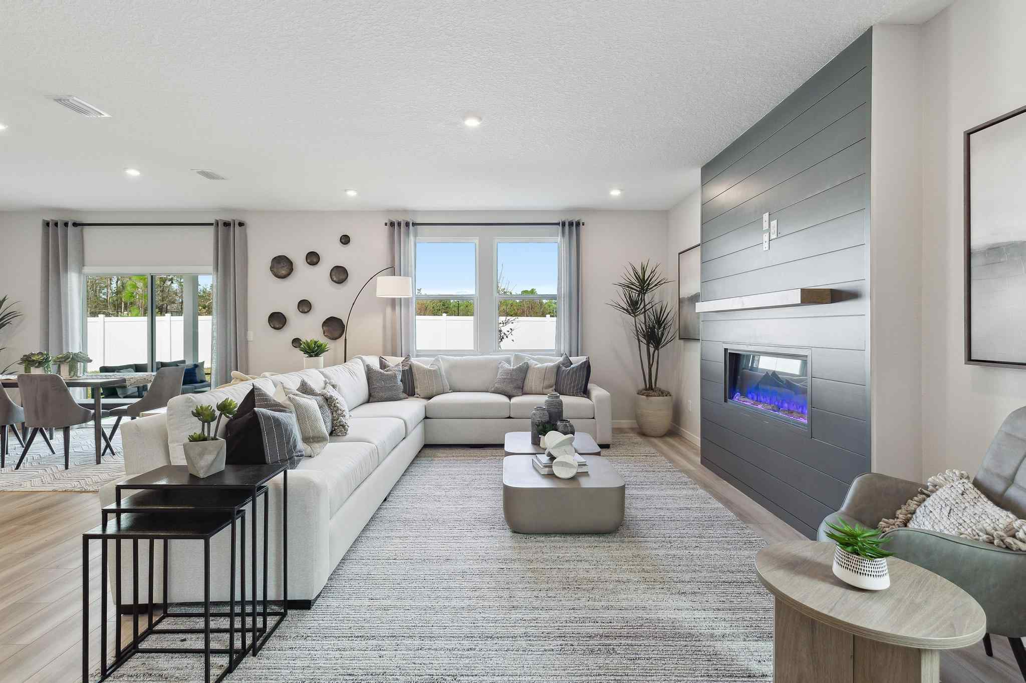 A living room with a fireplace.