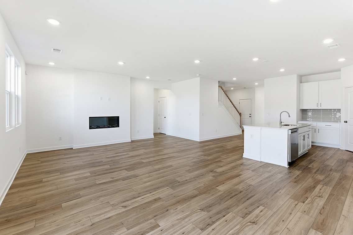 A large kitchen with white cabinets.