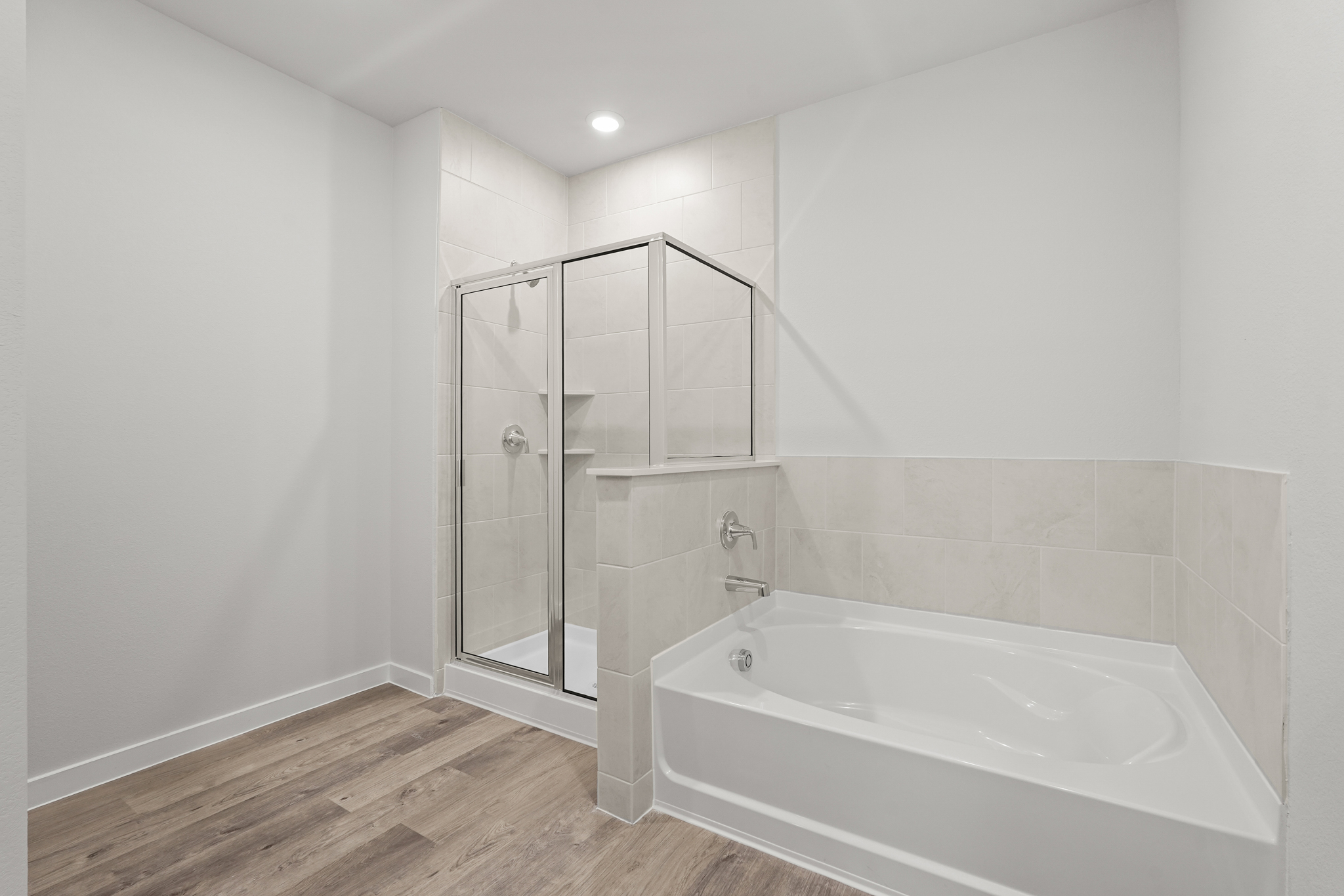 A bathroom with a glass shower.