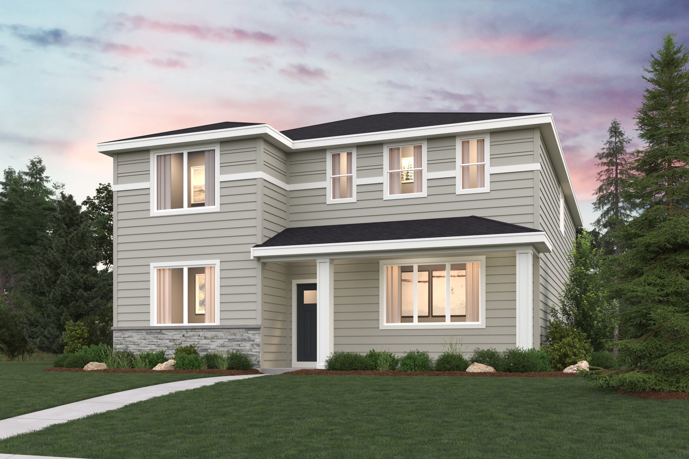 A house with a lawn in front of it.