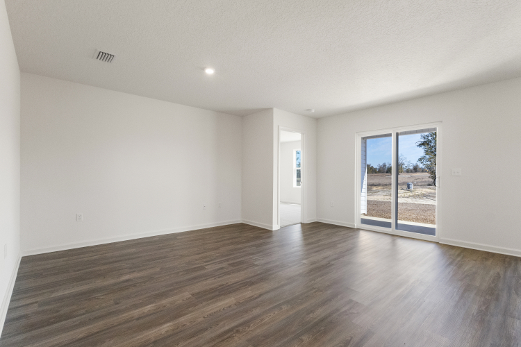 A room with a wood floor and a wood floor.