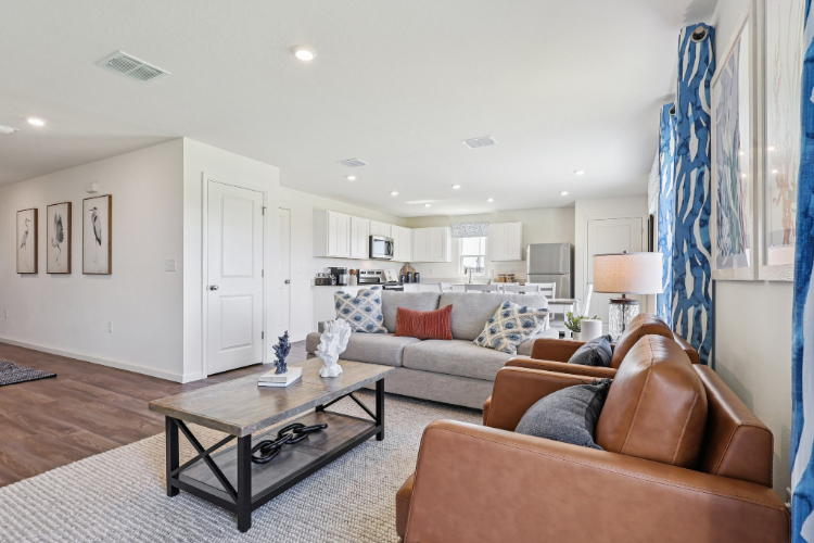 A living room with a couch and a coffee table.