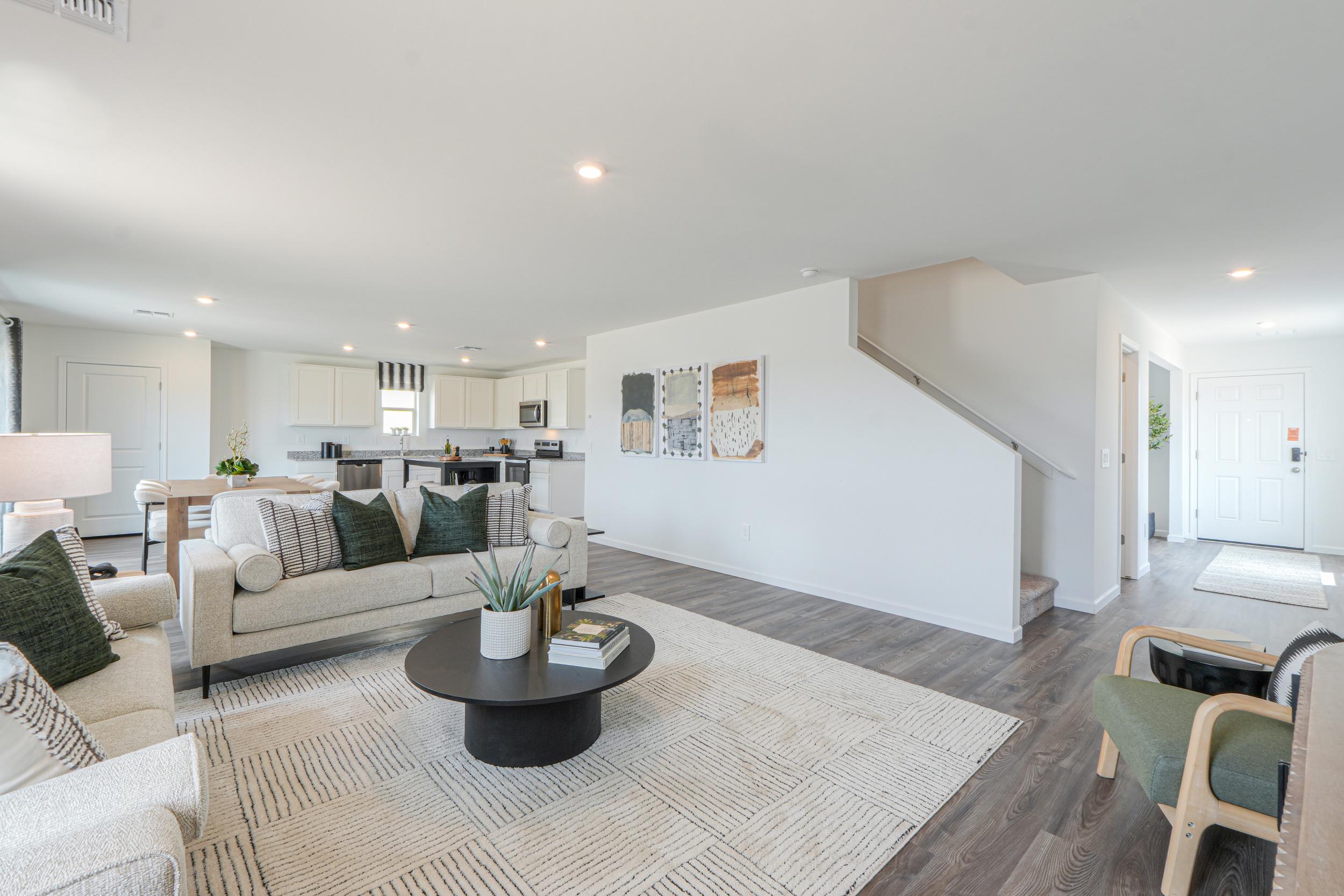 A living room with a couch and a coffee table.